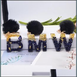 Key Rings Fashion Black Stone Gold Foil Filling English Letter Resin Keychain With Pompom Ball 26Words A To Z Gift For Woman Men Dro Otlyf