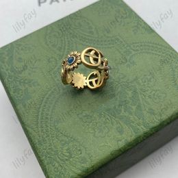 Designer Ring Golden Flower Pattern Love Luxury Rings Blue Diamond Fashion Womens Jewellery Men Shining Never Fade Not Allergic Size 6/7/8 Hot