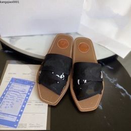 2023 Luxury designer women's slippers Canvas open-toe slippers with lettered flat beach outdoor slippers kqmkjkijk000004