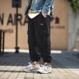 Men's Pants Mens Harajuku Harem 2023 Overalls Men Streetwear Black Cargo Male Loose Vintage Baggy Hip Hop Joggers For