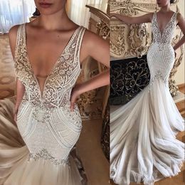 2023 Designer Mermaid Wedding Dresses Bridal Gown Pearls Crystals Beaded V Neck Tulle Lace Applique Ruffles Custom Made Vestidos de novia Plus Size