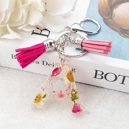 Keychains 1Pc Real Dried Flower Letter Alphabet Keychain Crystal Resin Words Key Chains Car Bag Tassels Pendent Charms Gift Accessory Fred22