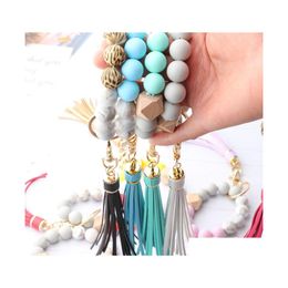 Party Favour 14 Colours Wooden Tassel Bead String Bracelet Keychain Food Grade Sile Beads Bracelets Women Girl Key Ring Wrist Strap Dr Dhhwu