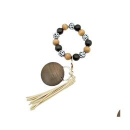 Key Rings Kimter Leopard Wood Beads Bracelet Ring With Tassel Circle Fashion Elastic Keychains For Lady Handbag Pendant Jewelry 2184 Dhyrn