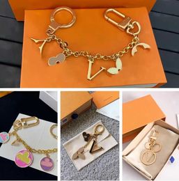 Luxury designers keychains Letters with diamonds keychain top Car Key Chain Women Buckle Jewellery Keyring