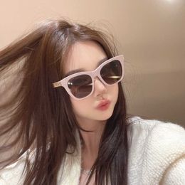 2023 luxury designer sunglasses 23 New Little Fragrance for Women High grade Sunscreen UV resistant Large Frame Hollow out Letter Legs Sunglasses 0774