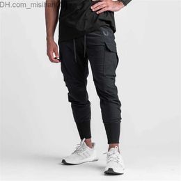 Men's Pants 2022 New Men's Cargo Pants Summer Thin Loose Quick Dry Elastic Tight Running Training Pants Casual Trends Trousers Z230802