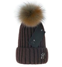 Autumn and Winter Ladies Pattern Warm Knitting Cap Raccoon Hair Ball Red and Black Plaid Wool Cap Cold Cotton Cap Real Raccoon Fur Ball