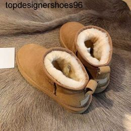 New 2023 australia designer mini snow boots mens women booties ugss fashion brand winter boot australie scuffs wool shoes sheepskin fur for men size 11 12 eu 43 Boots