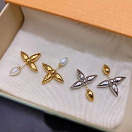 Modedesigner smycken stud kvinnor örhänge brev koppar guld pläterad elegant vinge charm örhängen ny stil med låda