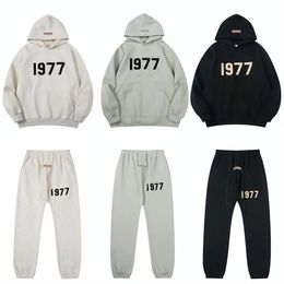 Designer Men's 1977 Essentialshirts Pants Fashion Numero casual Numero Sude Sude Jogging Hip Hop Essentialshoodie uomini di alta qualità