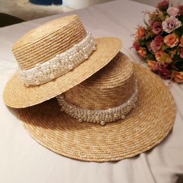 Visors Handmade pearl wheat straw flat hat wild big eaves female summer seaside beach 230804