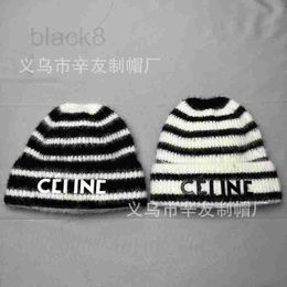Beanie/Skull Caps designer new black and white striped knitted hat in autumn winter, Korean version, warm ear protection, cold hat, versatile couple's wool 6D62