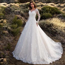 2021 Neue Dubai Elegante Lange Ärmel A-Linie Brautkleider Sheer Rundhalsausschnitt Spitze Applikationen Perlen Vestios De Novia Brautkleider wit267b