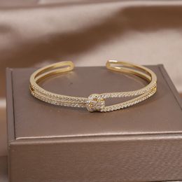 Bangle 14K real gold plating exquisite AAA luxury full zircon knot bracelet elegant womens wedding party opening adjustable 230807