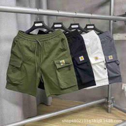 0j42 2023 Men's and Women's Fashion Shorts North American Tooling Brand Carhart Summer New Solid Color Workwear Large Pocket Casual Capris Couple Style