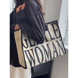 Shoulder Bags Commuter Big Bag Women's High Capacity 2023 New Canvas Bag High Sense Mommy Handheld Bag Tote Bag Women's Bagstylishhandbagsstore