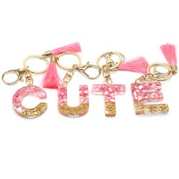 Decorative Objects Figurines 26 Initials Letter Key Pendant With Pink Tassel Fashion Girls Handbag Glitter Gradient Resin Alphabet Car Keychain Charms Gift 230809