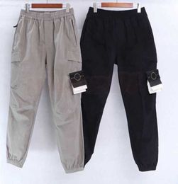 Mens Designer Track Stones Island Pants Womens Casual Cargo Multi-pocket Harem Trousers Fashion Hip Hop Elastic Waist Sportswear Leisure trend 552ess