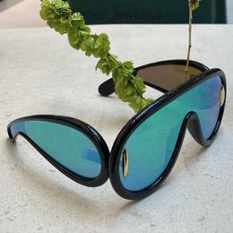 Designer Sunglasses Luxury Sunglass 23SS Womens mens Beach Wave Mask For Women Men Leisure vacation Glasses Shiny Black Frame Ocean blue lenses With original box