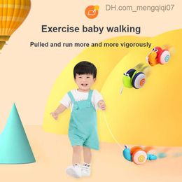 Pull Toys Pull rope cartoon snail car toy baby learning light and music crawling and pulling toys early childhood education toys for children Z230814