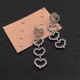 Girls Lovely Heart Earrings White Crystal Dangles Studs Personality Shinning Chandelier Earrings Luxury Female Studs Jewelry