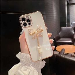 diamond encrusted phone Luxury cases iPhone 14 13 12 pro max 11 7 8 plus X XR XS xsmax Electroplated pearl bow all - wrapped lens soft silicone fall - proof cover