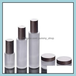 Packing Bottles Frosted Glass Cosmetic Jars Pump With Plastic Woodgrain Cap 30G 50G 30Ml 100Ml 120Ml Body Lotion Lip Balm Cream Cont Otgpj