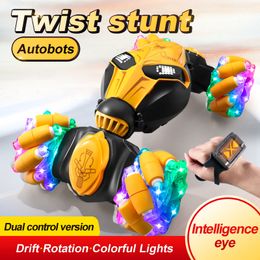 Transformation toys Robots 2.4G stunt twist RC car LED colorful intelligent eye light 4WD drift car off-road climbing radio control children's toys gift 230811