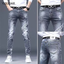 Men's Pants Mens stretch denim print pants jeans Korea slimming trendy casual allmatch light luxury men for 230812