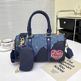 Designer Bag 2024 New Launch Early Travel made of fabric with large printing and indentation co branded denim single shoulder crossbody