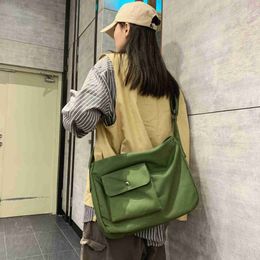 Messenger Bags Korean Canvas Multi Pockets Canvas Big Size Handbag Female Male Teenager Student Over Large Street Hip Hop Zipper Messenger Bag L230814