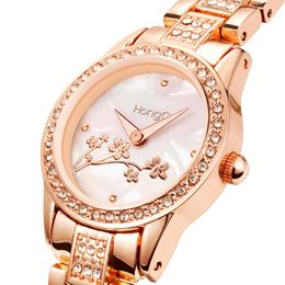 Wristwatches Female Shell Small Dial Quartz Watch Sky Star Simple Luxury Niche Bracelet Spiral Crown