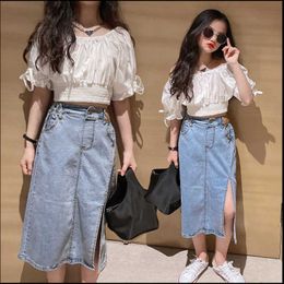 Clothing Sets Clothing Sets New Summer Girls' Fashionable Set Big Children's Clothing Shoulder Shirt+ Split Denim Skirt 4-13Y