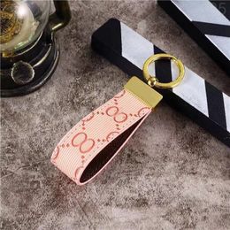 Delicate luxury keychain wallet mens designer keyrings leather useful holiday gift couple style bags charms gold plated letter pink car keychains woman PJ068 C23