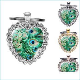 Keychains Lanyards Ethnic Green Boho Peacock Feather Glass Art Heart Keychain Handmade Jewellery Top Grade Metal Key Ring Holder 4 Col Dhl2E