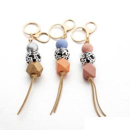 Keychains Lanyards Wood Beads Keychain Mticolor Geometric Tassel Keyring For Bag Leopard Striped Cow Round Wooden Keyrings Gifts 124 Dhen5