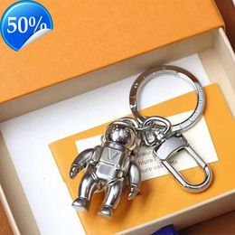 Keychains Lanyards Keychain designer keychain Luxury Metal Sense Design Humanoid Fashion Casual Style Key chain Versatile Popular Hanging Bag Phone Case very good