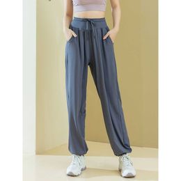 Loose fitting high waisted sports pants for women in spring and autumn morning running training closed loop leggings for slimming fitness yoga and quick drying pants