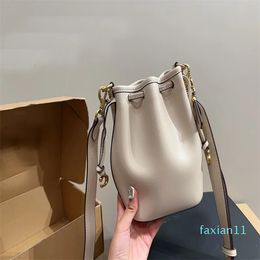 Drawstring Shoulder Bag Large Capacity Bucket Handbag Solid Colour Soft Leather Hardware Pendant Strapping Type Adjusting Strap High Quality Shopping Bags