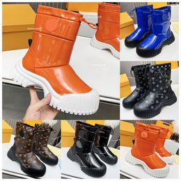 Stivaletto piatto rubino Designer Donna Stili autunno inverno deserto BootChunky Leggero lusso Suola in gomma nera Suola spessa Stivali da pioggia casual