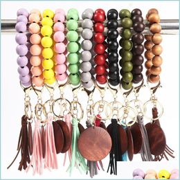 Keychains Lanyards 11 Colours Wooden Bracelet Keychain With Tassels Keys Diy Wood Fibre Pandent Woodwooden Bead Bangle Key Decorate F Dh7C2