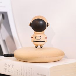Decorative Objects Figurines Magnetic Levitation Astronaut Log Decoration Creative Toys for Men and Women Birthday Gifts 230815