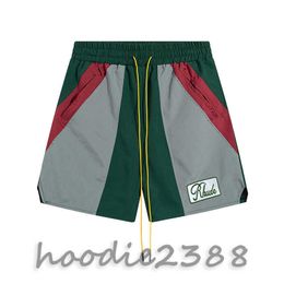 RHUDE green Europe and the United States fashion brand Colour matching micro standard tethered casual shorts men and women high street beach sports five quarter pants