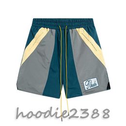 RHUDE blue Europe and the United States fashion brand Colour matching micro standard tethered casual shorts men and women high street beach sports five quarter pants