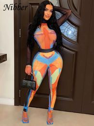 Women s Two Piece Pants Nibber Colourful Printing Set Women Mesh See Through Bodysuits High Waist Skinny Trousers Female Streetwear Suit 230815