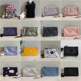 Evening Bags -Selling Women's Handbags With Stripe Printing In A Solid Colour Style Nylon Shoulder Bag Comes Monkey Pendant