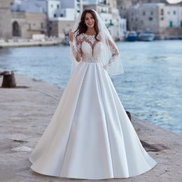 Luxury Beading Wedding Dress Illusion Long Sleeves Appliques Satin Bridal Gown A Line Robe Mariage Wedding Gown for Bride