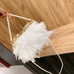 Factory wholesale ladies shoulder bags 3 Colours sweet and elegant fire chicken feather chain bag metal pinch women handbag small fresh beaded pearl handbags 10787#