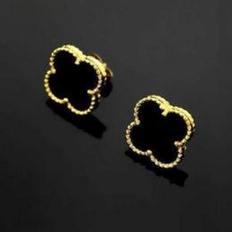 Four-leaf clover earrings with sterling silver and 18K gold are exquisite and micro-inlaid with new fashion wedding accessories in 2023.
